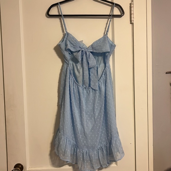 Polka dot textured babydoll dress. Tie back with bow and knot neckline - Picture 3 of 3